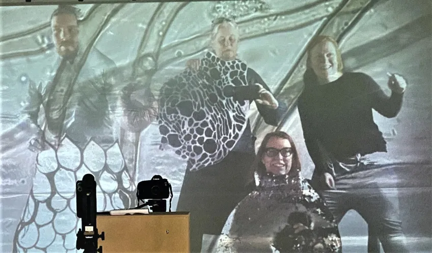 Double exposure of people and microbes. Photo.